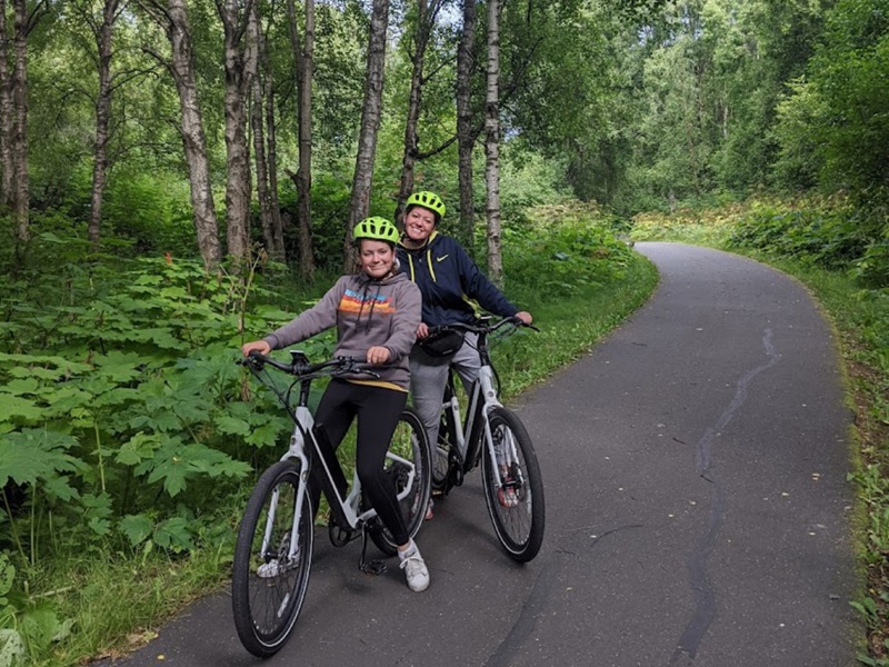 Couple riding on trail